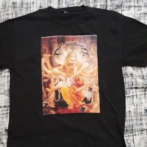 A black graphic t shirt of the hindu god narasimha